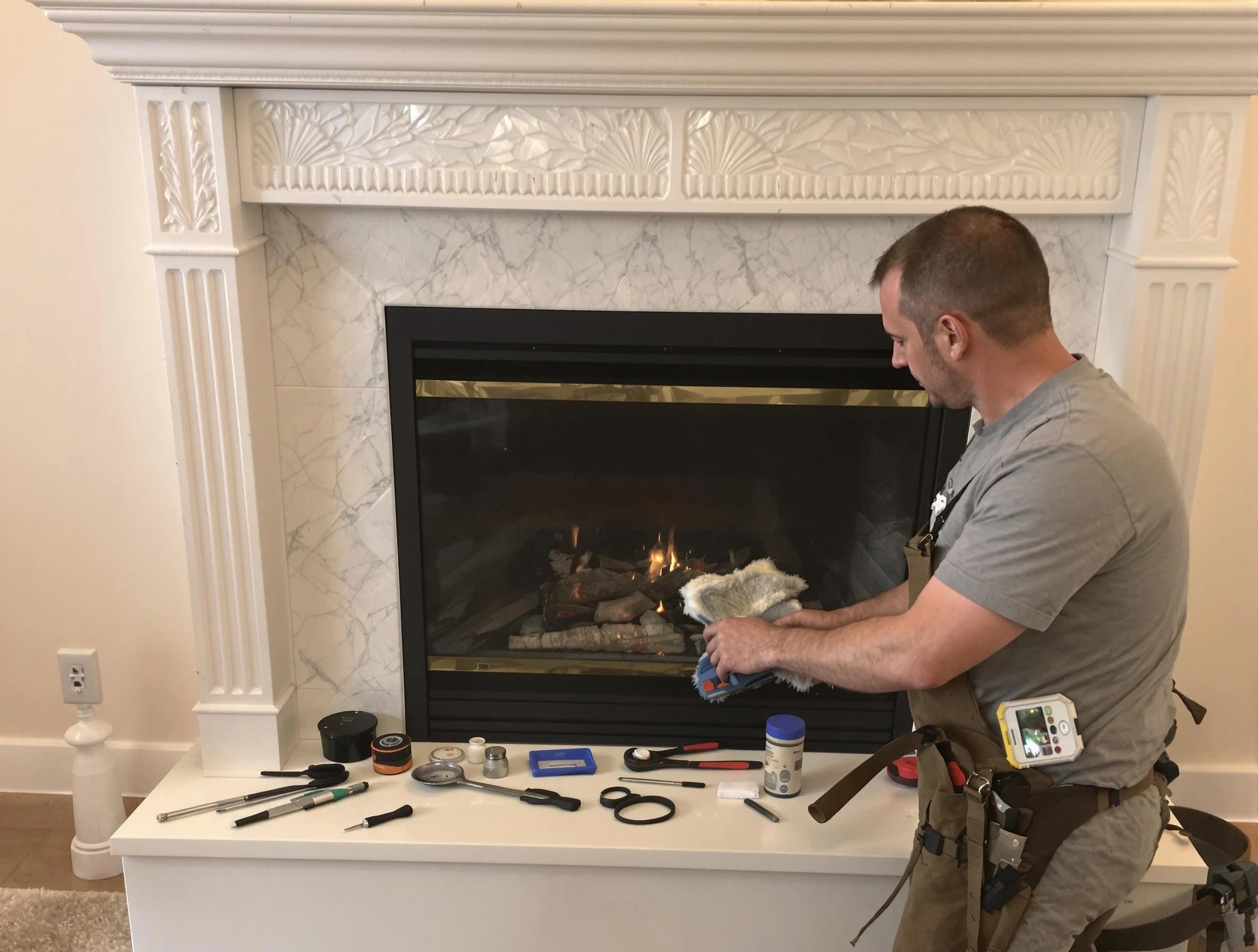Pine Chimney Sweep performing fireplace maintenance in Pine, PA